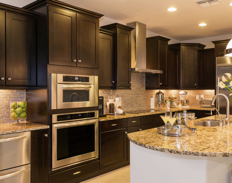 black-kitchen-cabinet-with-granite-countertops-recessed-lighting